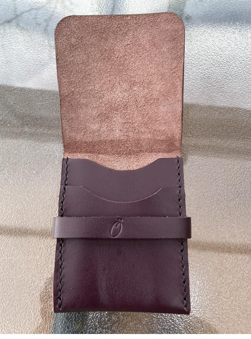 Open card wallet showing internal card slots